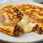 Beef Meximelt Recipe served on a plate with salsa