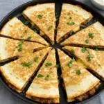 Ground beef cheesy quesadillas with melted cheese on a plate