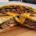 Juicy Blackstone quesadilla burger with melted cheese and crispy tortillas