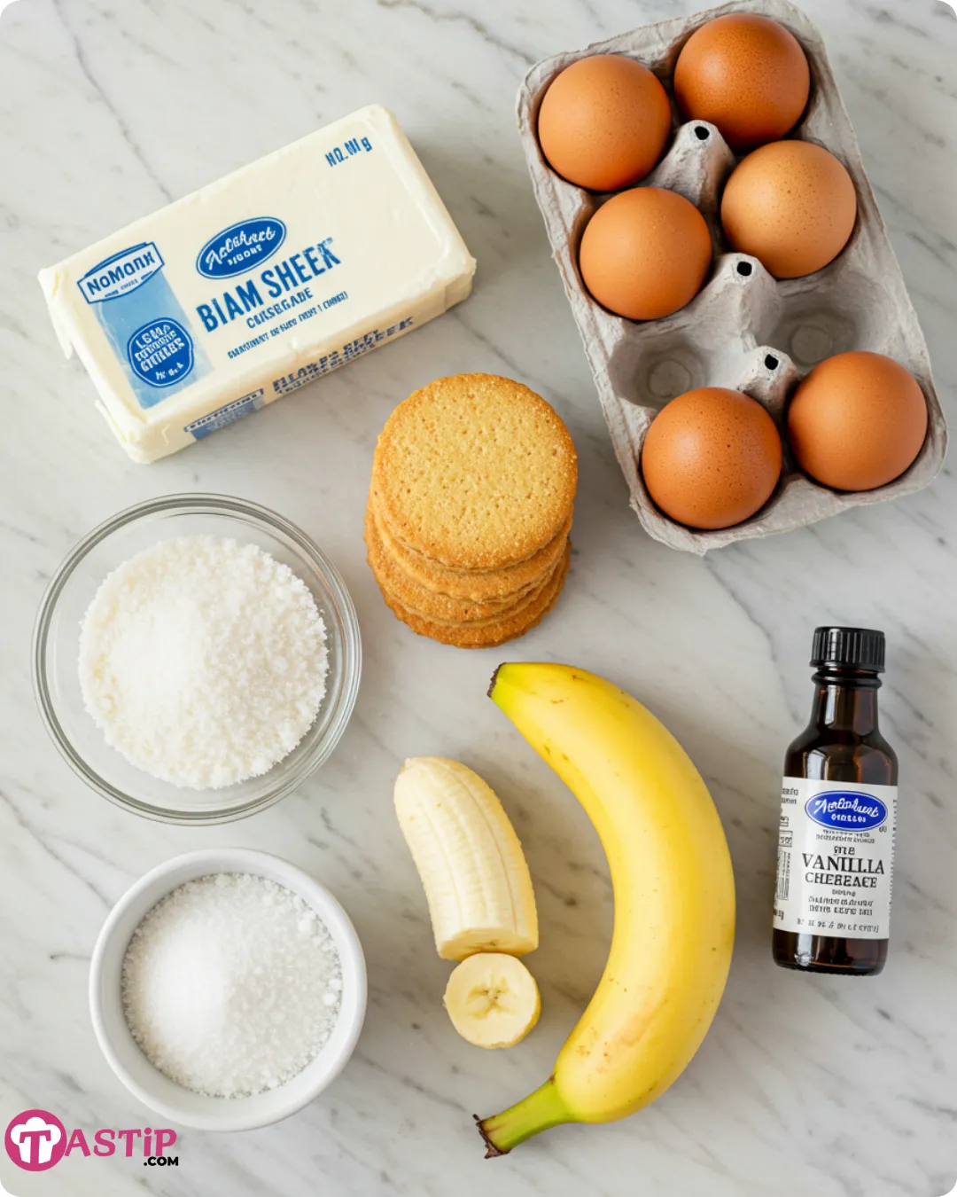 Ingredients for mini banana pudding cheesecakes on marble