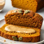 Healthy Pumpkin Bread slice with almond butter