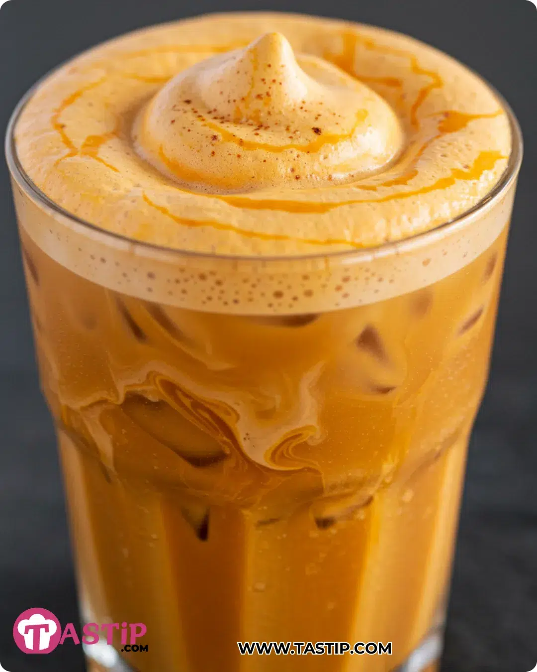 Iced Pumpkin Cream Chai Tea with marbled pumpkin cold foam