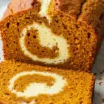 Text: Pumpkin Cream Cheese Bread with defined creamy swirl