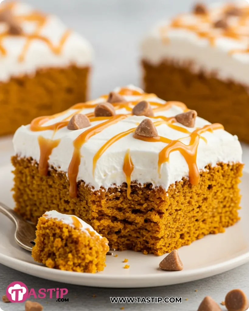 Pumpkin Poke Cake 11 Serving of Pumpkin Poke Cake with caramel drizzle